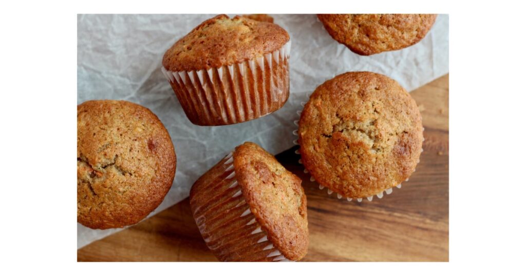 4 muffins on a table