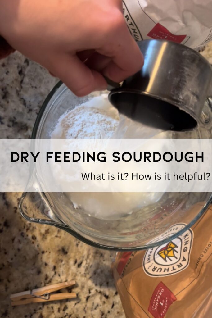 Hand pouring flour into a bowl