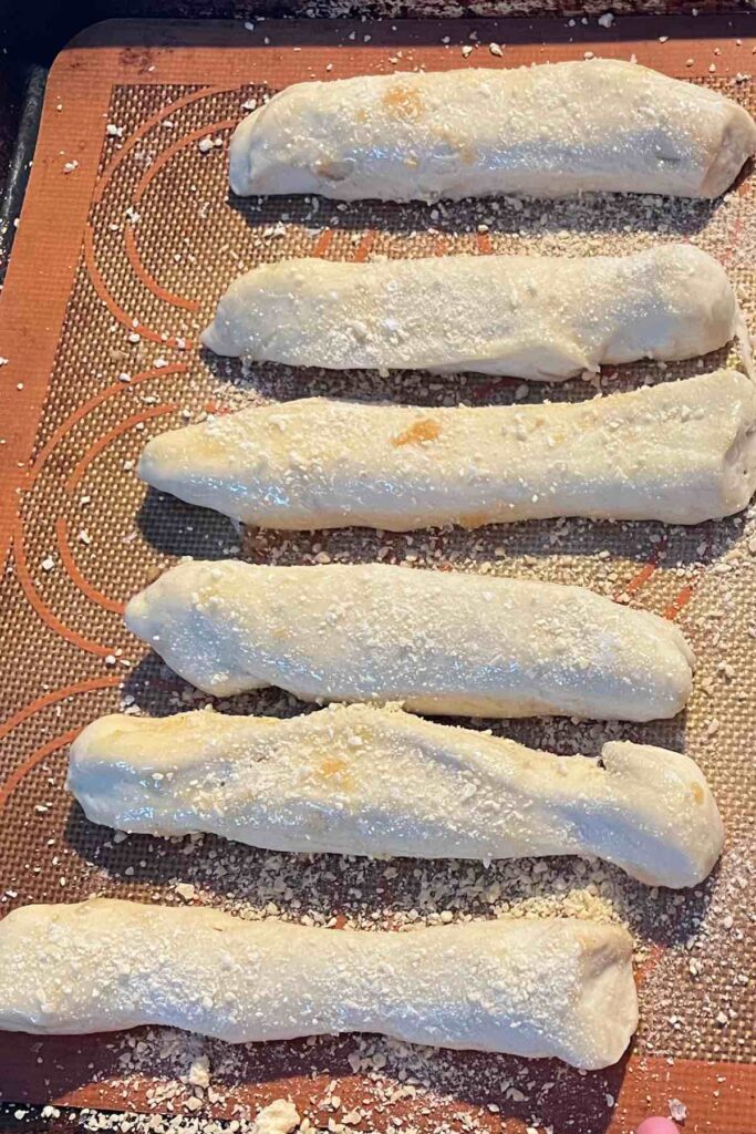 sourdough breadsticks on sheet pan.