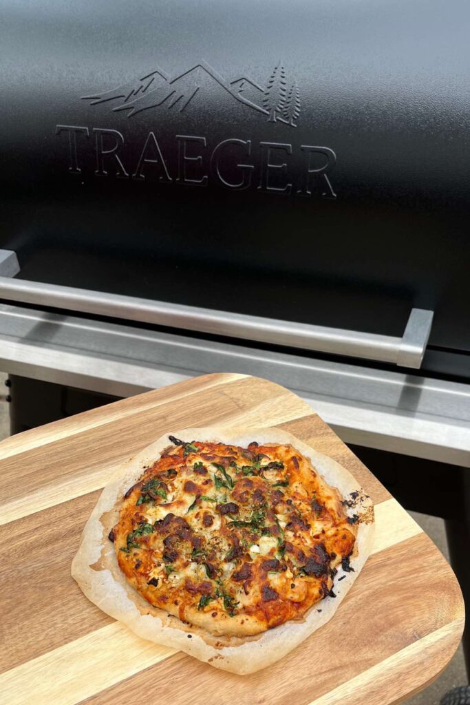 sourdough pizza on pizza peel.