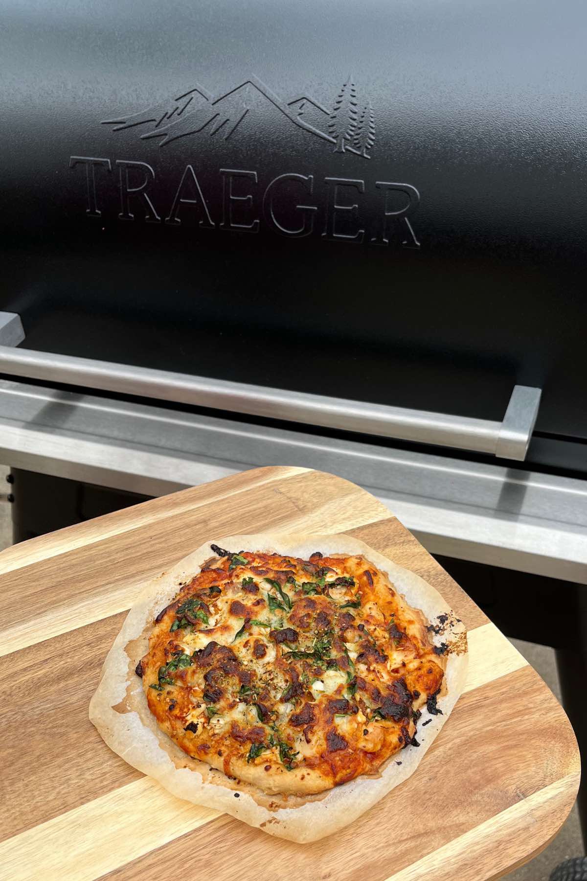 sourdough pizza on pizza peel.