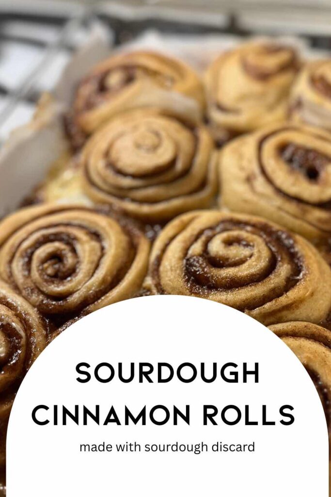 sourdough cinnamon rolls with text in front.