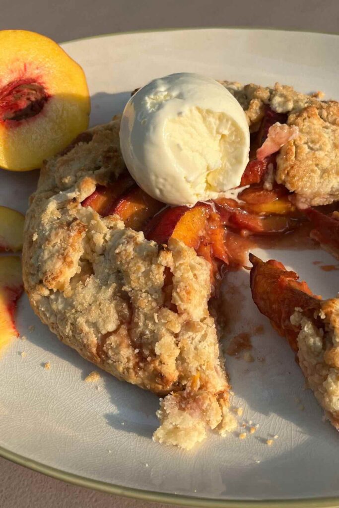 sourdough peach galette with vanilla ice cream.