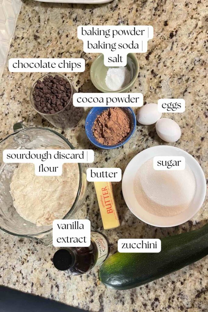ingredients for double chocolate zucchini muffins with labels.