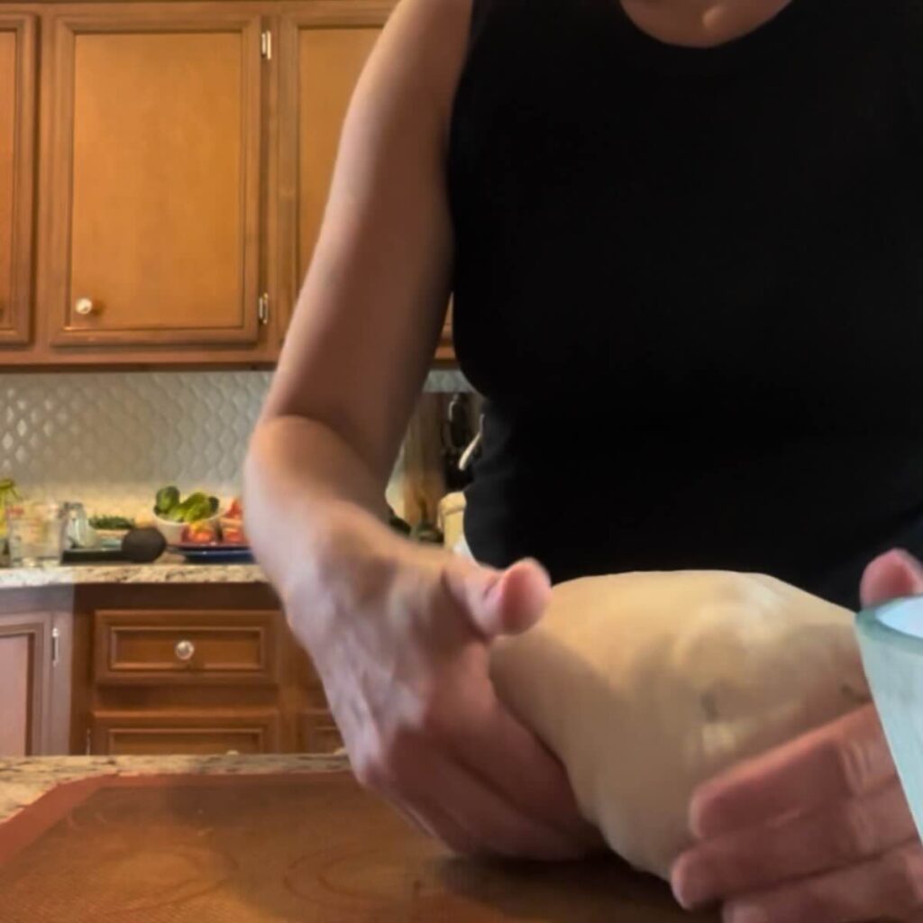 shape sourdough bread on a countertop.