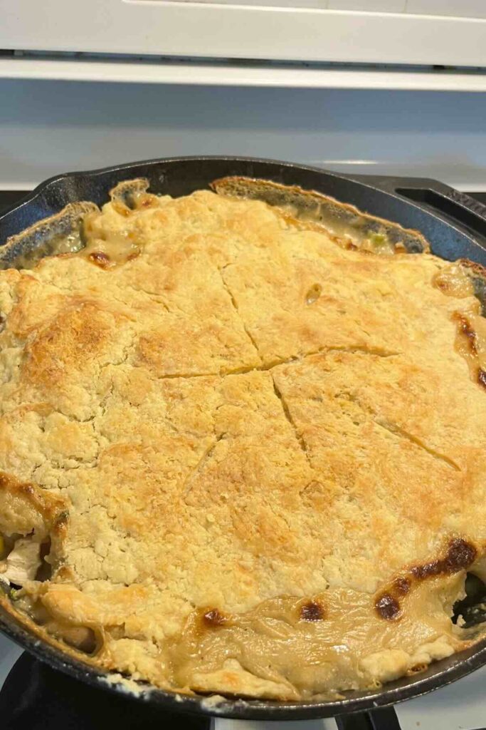 chicken pot pie in cast iron skillet.