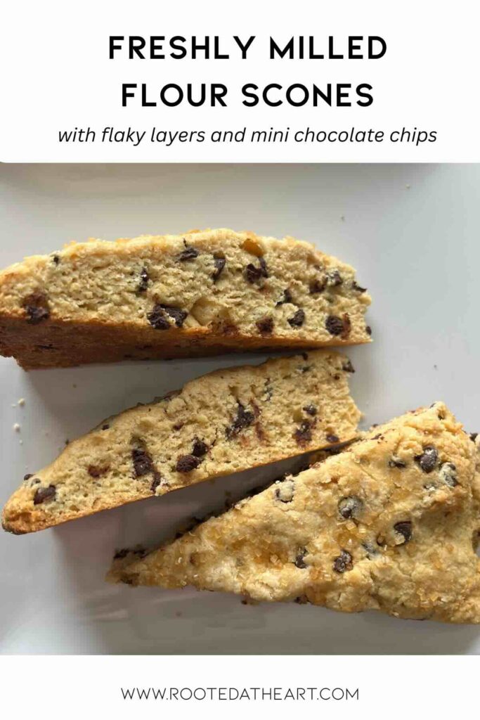 three freshly milled flour scones on a plate with a description.