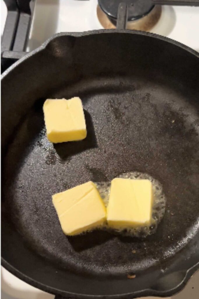 butter in cast iron skillet.