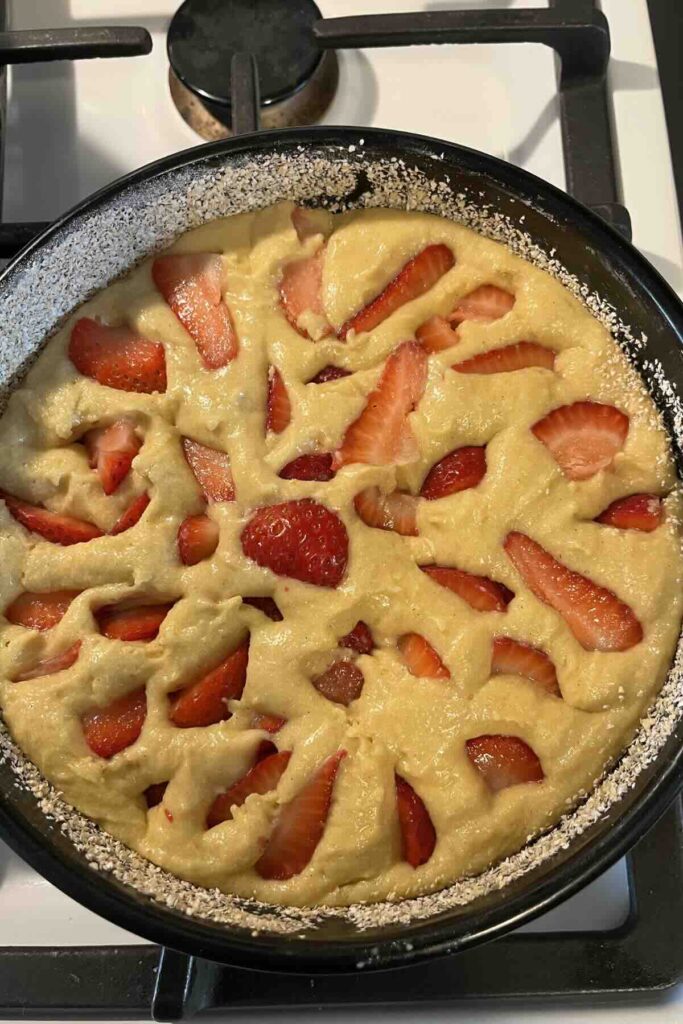 strawberry cake with fresh milled flour in pan.