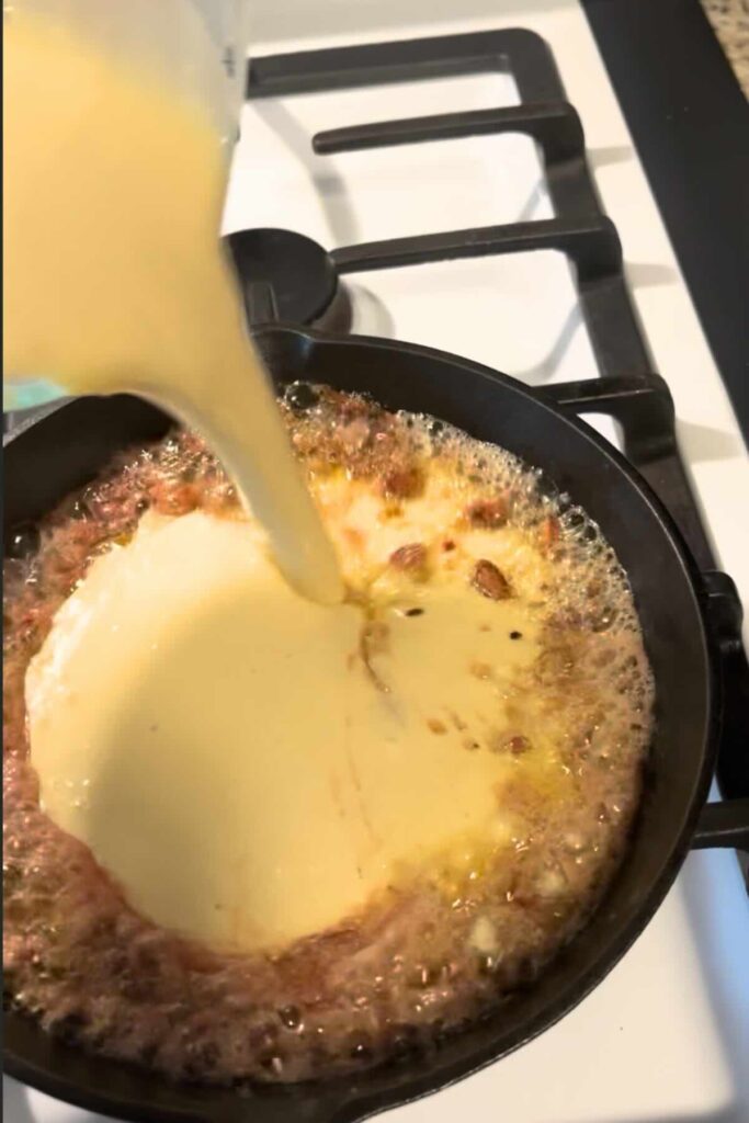 sourdough dutch baby with rhubarb batter.