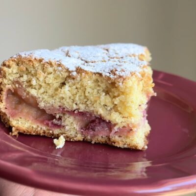 slice of whole wheat strawberry cake on a plate.